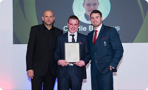 Charlie Beddows receives his award