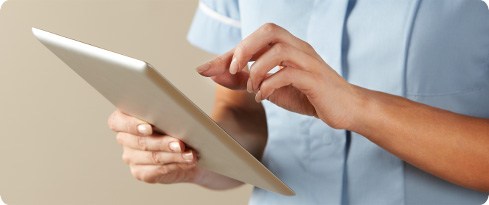 Image: nurse using digital tablet