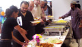 Food being served to staff, patients and visitors at the QEHB Eid celebrations