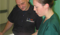 Wolverhampton fire fighter Dave Hardaker discusses the care of a burns patient with Staff Nurse Helen Paddon