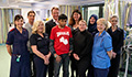 Obayed Khan with members of the clinical research facility team