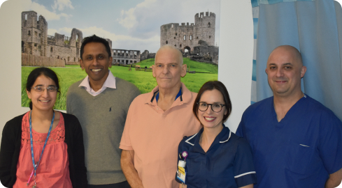 Keith Eversham  with members of the surgical team