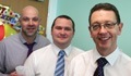 Image (L-R): colleagues Martin Roch and Dan Kearns say farewell to Chris Gaskin