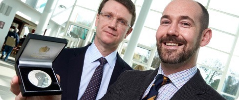 Image: Dr Andrew Bentall, right, shows off the Medawar Medal to colleague Dr Simon Ball
