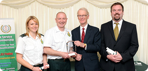 Dr David Balthazor, Kat Ellis, Ian Walley receive Air Ambulance Award from Lord Ian McColl