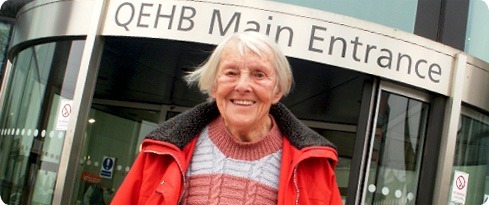 Image: Mollie Smith outside the Main Entrance at QEHB