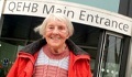 Image: Mollie Smith outside the Main Entrance at QEHB