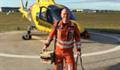 Mark Beasley, The Air Ambulance Service (TAAS) Critical Care Paramedic, standing in front of a helicopter