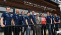 Image: charity riders outside the Centre for Clinical Haematology at QEHB