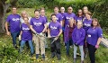 Image: volunteers helping a stroke survivor with a garden makeover