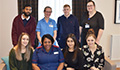 Image: current members of the Youth Support Group with UHB staff