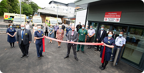 UHB Chief Executive Dr David Rosser cutting the ribbon outside the new Children's Emergency Department entrance