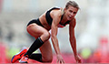 Image: Hayley struggles to cross the finish line at the London Marathon